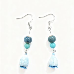 Handmade blue-dyed poppy earrings with ceramic beads